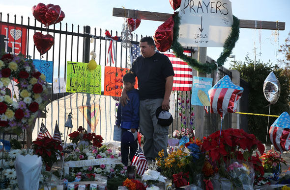 Mourners paying their respects to the victims