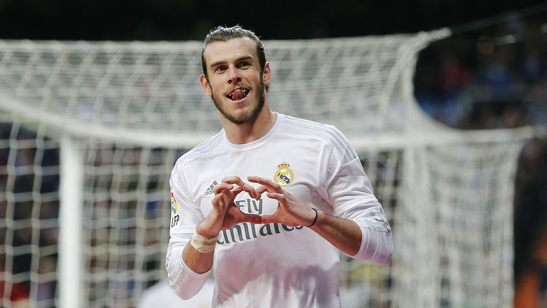 Gareth Bale celebrates after scoring Real Madrid's eighth goal against Rayo Vallecano at the Bernabeu