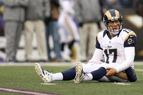 BALTIMORE MD- NOVEMBER 22 Quarterback Case Keenum #17 of the St. Louis Rams sits on the turf during a game against the Baltimore Ravens in the fourth quarter at M&T Bank Stadium