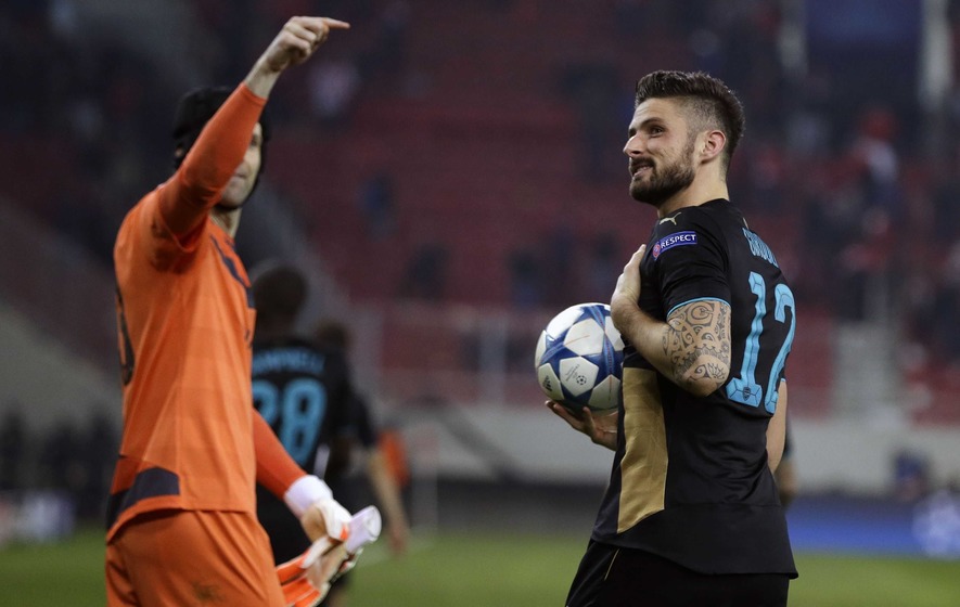 Giroud targets last eight as Arsenal reach knockout stages