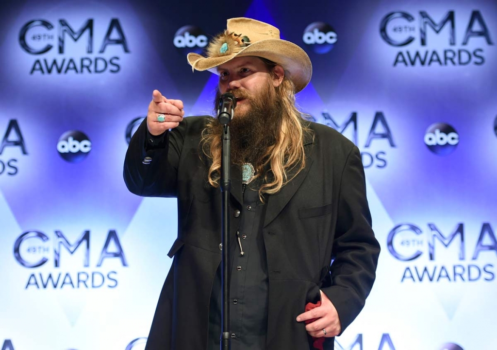 Chris Stapleton winner of the awards for new artist of the year album of the year for'Traveller' and male vocalist of the year participates in an interview in the press room at the 49th annual CMA Awards at the Bridgestone Arena in Nashville