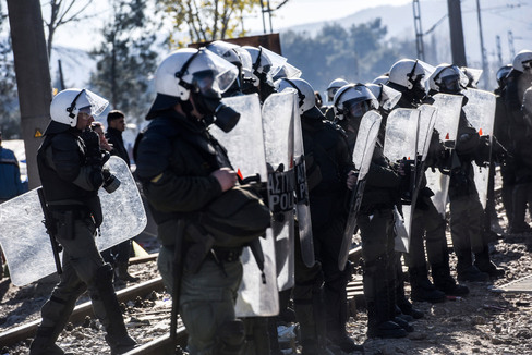 Greek police try to control the Greek Macedonian border on Dec. 3