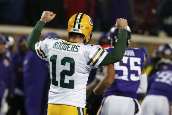 Green Bay Packers quarterback Aaron Rodgers celebrates