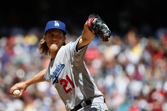 PHOENIX AZ- APRIL 12 Starting pitcher Zack Greinke #21 of the Los Angeles Dodgers pitches against the Arizona Diamondbacks during the MLB game at Chase Field