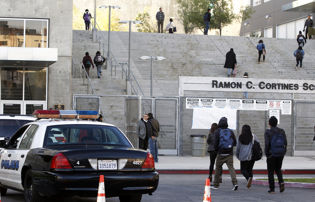 Students arrive at the Ramon C. Cortines School of Visual and Performing Arts in downtown Los Angeles on Wednesday Dec. 16 2015. Students are heading back