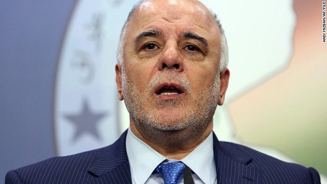 Haider al Abadi speaks to the media after an Iraqi Parliament session in Baghdad