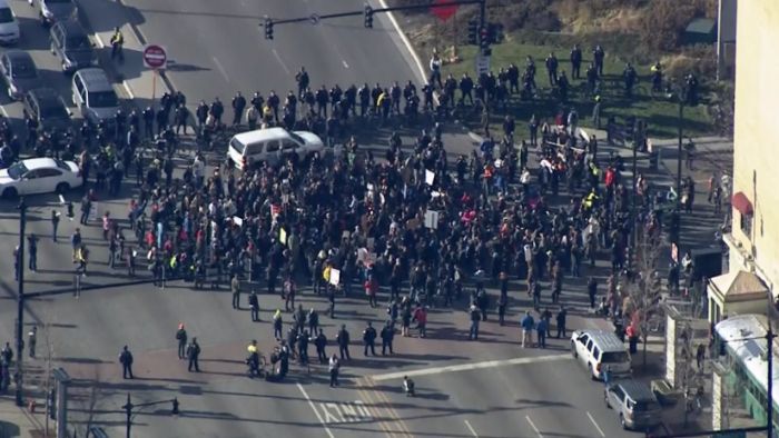 Hundreds of angry demonstrators shut down busy Chicago streets Wednesday calling on Mayor Rahm Emanuel to step down in the wake of recent police shootings