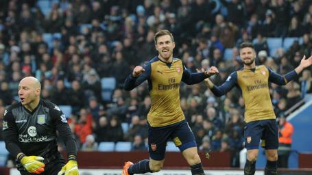 Image Text
 CLINCHER Aaron Ramsey celebrates after scoring Arsenal's second goal at Villa Park