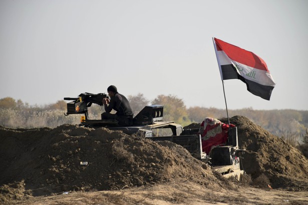 Iraqi Security forces enter downtown Ramadi on Sunday.         
                     AP