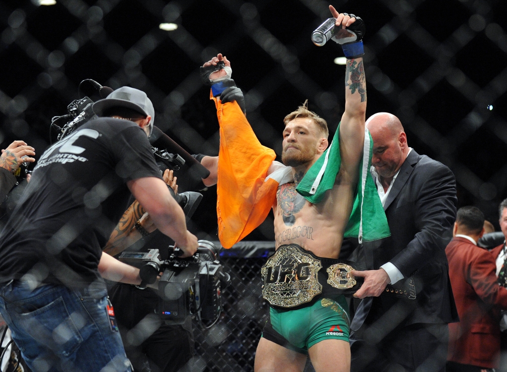 McGregor, Aldo make weight for title fight at UFC 194