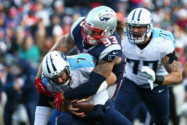 Jabaal Sheard rips down Tennessee QB Zach Mettenberger Sunday at Gillette