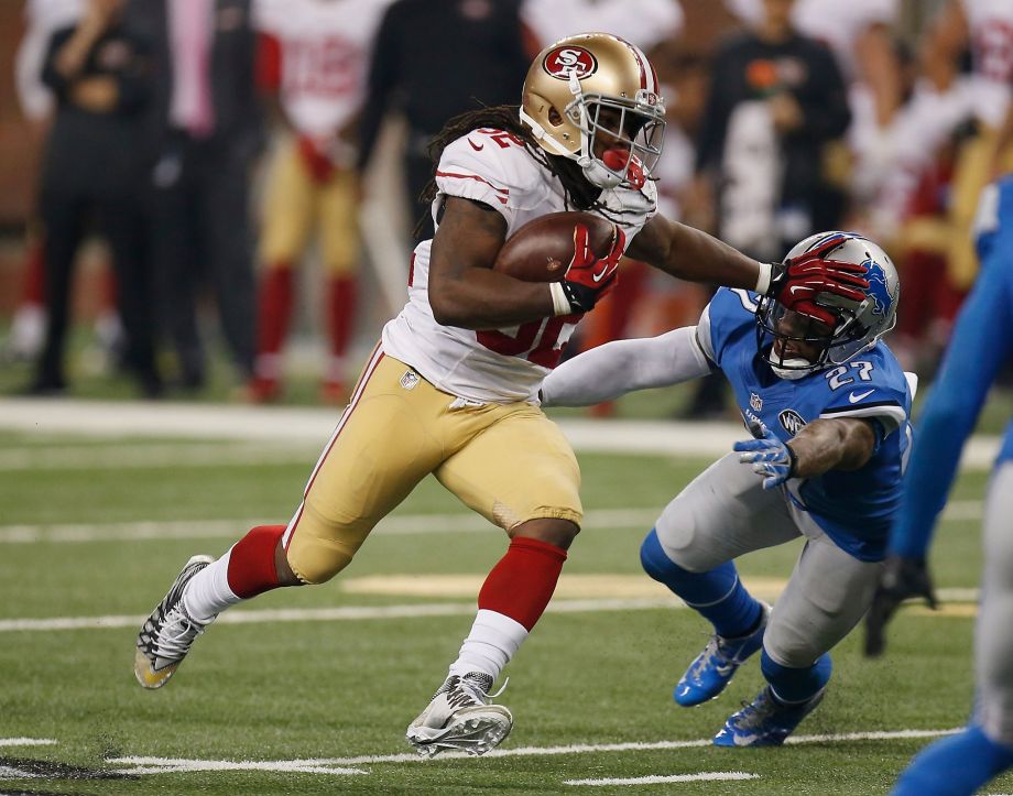 New 49ers running back Du Juan Harris eludes Glover Quin of the Lions in the second quarter. Harris had an impressive debut gaining 73 yards on 11 carries and adding a catch for 11 yards