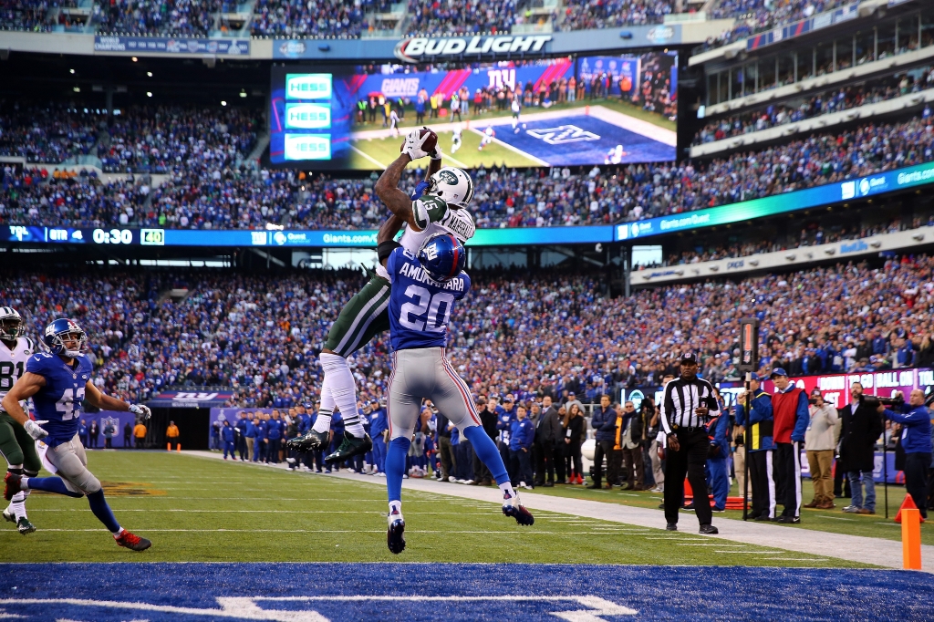 Brandon Marshall of the New York Jets catches a touchdown late in the game against Prince Amukamara and the New York Giants at Met Life Stadium on Dec. 6 2015