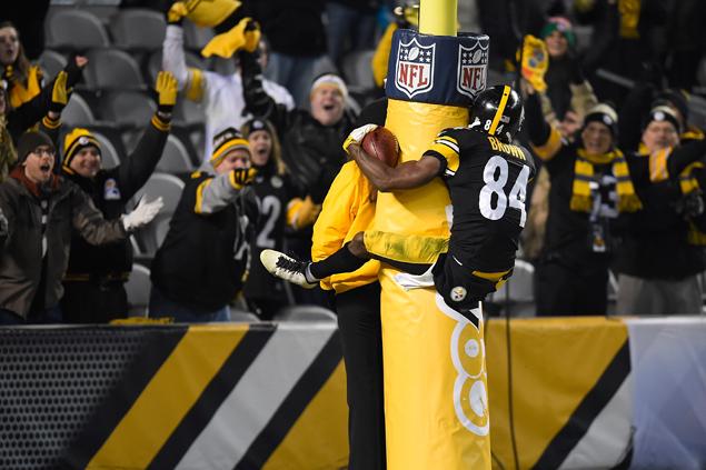 Antonio Brown goes er groin first into the goalpost