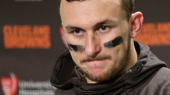 Cleveland Browns quarterback Johnny Manziel speaks with media members after an NFL football game against the Seattle Seahawks Sunday Dec. 20 2015 in Seattle. The Seahawks won 30-13