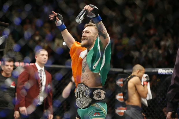 Conor Mc Gregor reacts after defeating Jose Aldo during a featherweight championship mixed martial arts bout at UFC 194 Saturday Dec. 12 2015 in Las Vegas