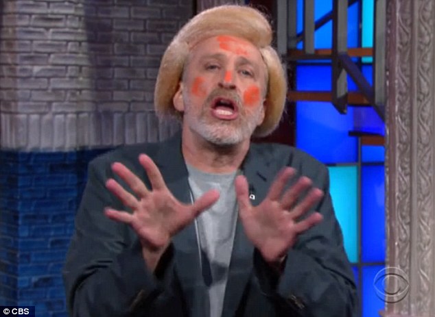 Impression Jon Stewart donned a blond wig and and Cheetos dust to give a hilarious Trump impression during an appearance on the Late Show with Stephen Colbert on Thursday