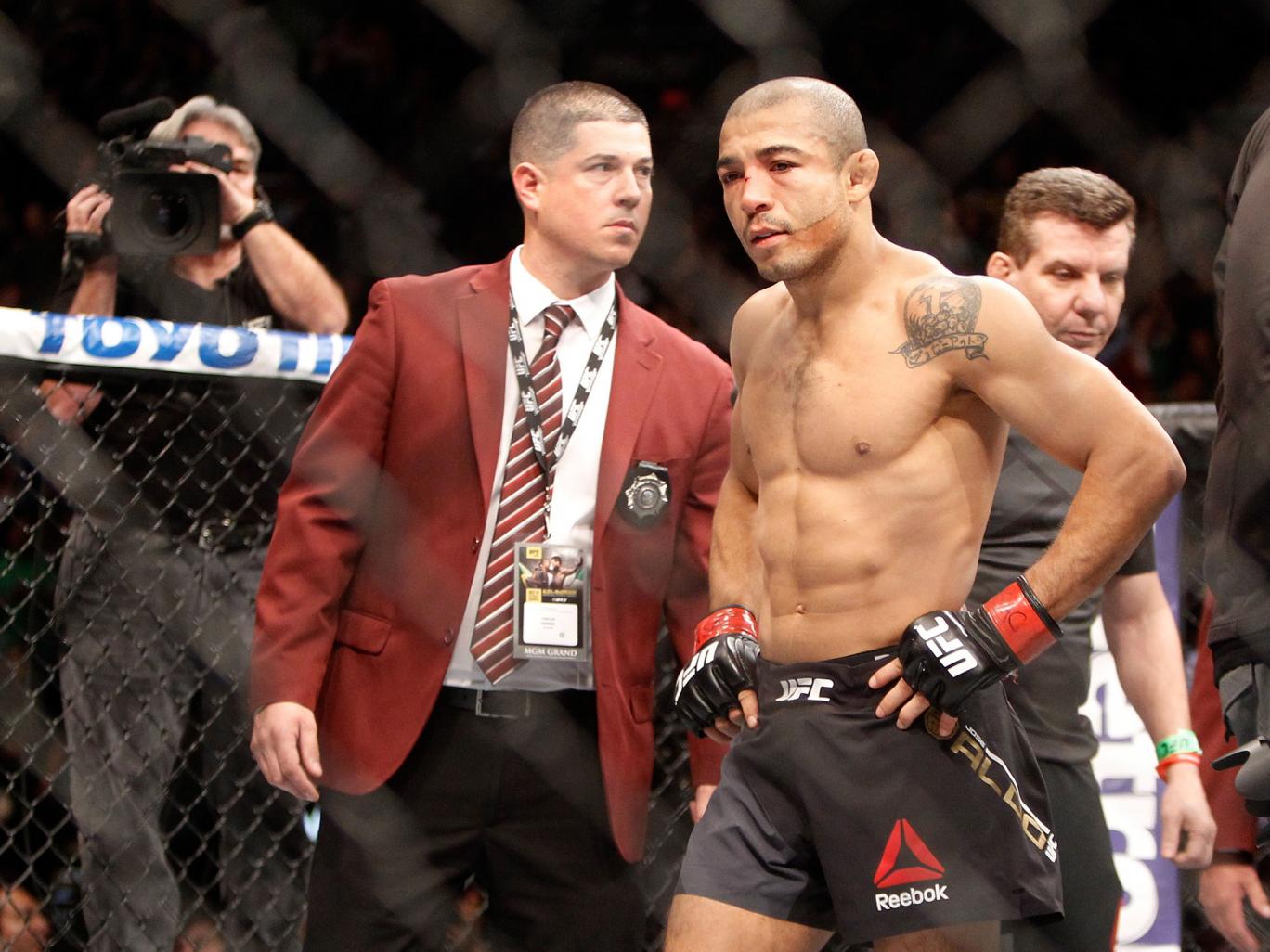 Jose Aldo reacts after his UFC 194 defeat to Conor Mc Gregor Getty Images