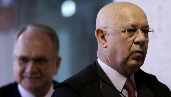 Judge Teori Zavascki and Judge Luiz Fachin arrive at a session at the Supreme Court in Brasilia Brazil Dec. 17 2015