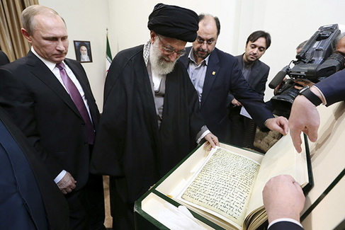 Khamenei receives a replica of an ancient handwritten Koran from Putin