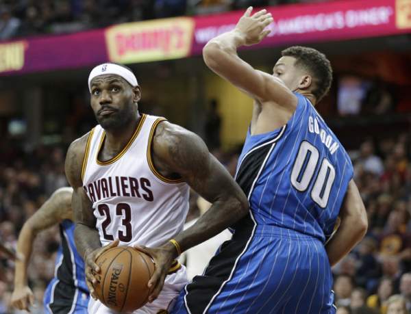 LeBron leads Cavs past Magic, joins Robertson on elite list