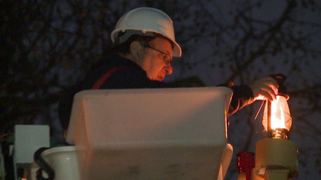 Lighting of the menorah on the first night of Hanukkah