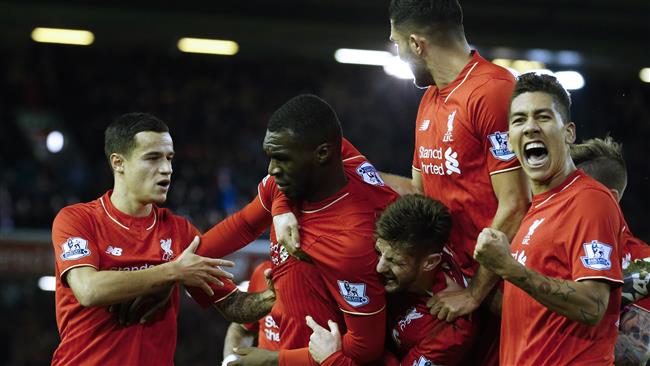 Liverpool players cheering after scoring the only goal against Leicester City. AFP