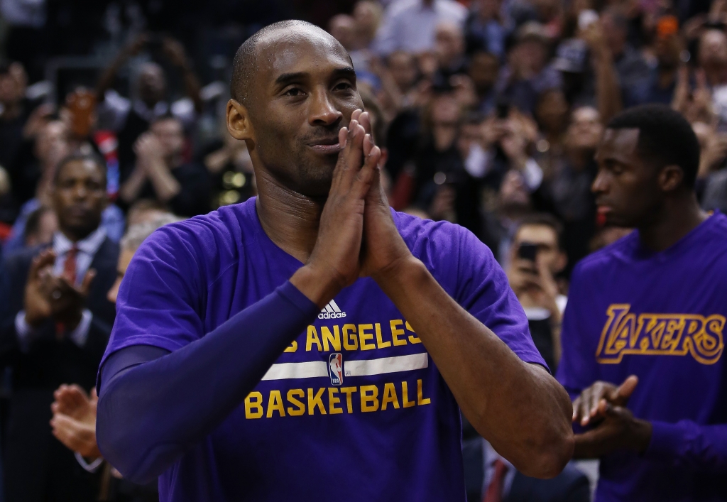 TORONTO ON- DECEMBER 07 Kobe Bryant #24 of the Los Angeles Lakers thanks the crowd following a video tribute to him during an NBA game against the Toronto Raptors at the Air Canada Centre