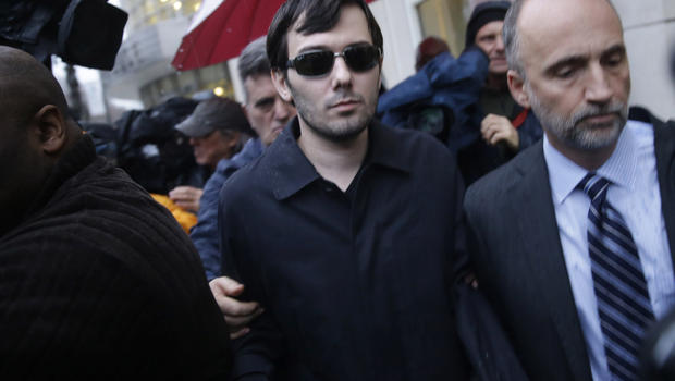 Martin Shkreli center leaves the courthouse after his arraignment in New York on Dec. 17 2015. AP