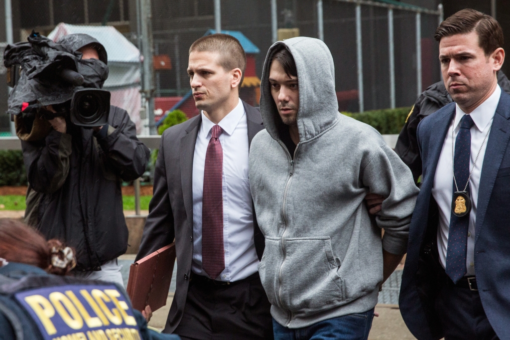 NEW YORK NY- DECEMBER 17 Martin Shkreli, CEO of Turing Pharmaceutical is brought out of 26 Federal Plaza by law enforcement officials after being arrested for securities fraud