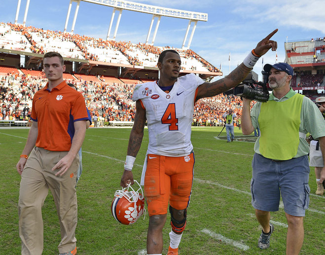 Clemson quarterback Deshaun Watson gestures to the fans after an NCAA college football game against South Carolina Saturday Nov. 28 2015 in Columbia S.C. Clemson won 37-32