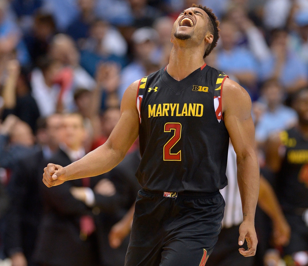 CHAPEL HILL NC- DECEMBER 01 Melo Trimble #2 of the Maryland Terrapins reacts after making a three-point shot against the North Carolina Tar Heels during their game at the Dean Smith Center