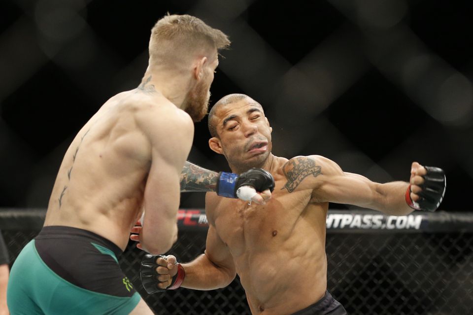 Conor Mc Gregor stops Jose Aldo in 13 seconds wins UFC belt