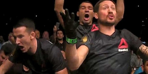 McGregor's whole coaching staff erupted in ecstasy after the 27-year-old knocked out Aldo in 13 seconds