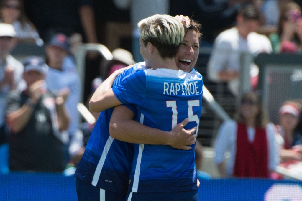 Megan Rapinoe hugs Abby Wambach during a friendly this year.- Kyle Terada-USA TODAY Sports