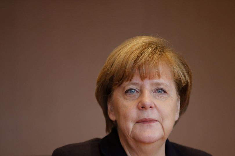 Merkel defends contested refugee stance