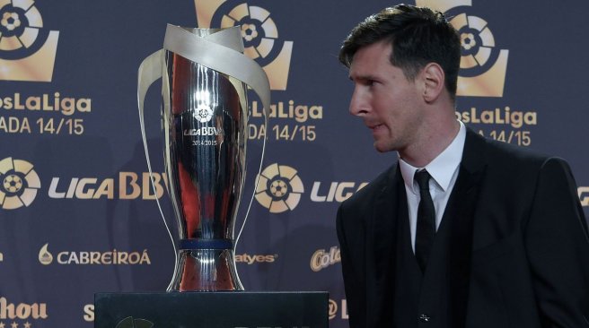 Barcelona's Argentinian forward Lionel Messi looks on as he poses before the LFP 2014-2015 season award ceremony in Barcelona