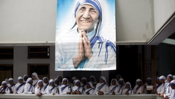 Catholic nuns from the order of the Missionaries of Charity gather under