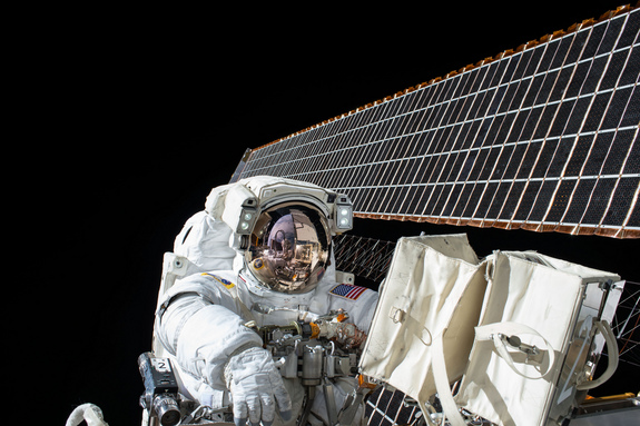 NASA astronaut Scott Kelly is seen during a spacewalk outside the International Space Station on Nov. 6 2015. He and crewmate Tim Kopra will likely perform a surprise spacewalk on Monday Dec. 21 to repair the station's stuck Mobile Transporter