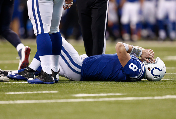 INDIANAPOLIS IN- DECEMBER 20 Matt Hasselbeck #8 of the Indianapolis Colts lies injured on the ground during the game against the Houston Texans at Lucas Oil Stadium