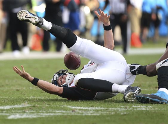 Matt Ryan fumbles the ball as he is sacked by Carolina Panthers defensive tackle Kawann Short during the second half an NFL football game in Charlotte N.C. Sunday Dec. 13 2015. (Curtis Compton  Atlanta Journal-Constit