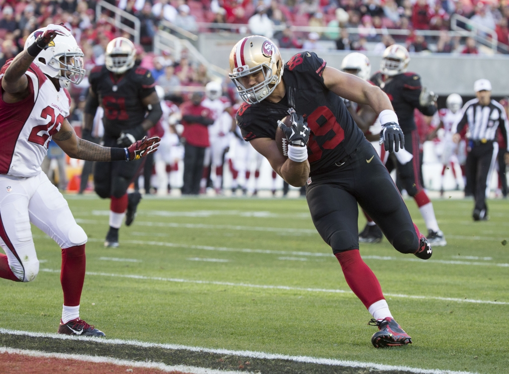 Nov 29 2015 Santa Clara CA USA San Francisco 49ers tight end Vance Mc Donald runs in for a touchdown against Arizona Cardinals free safety Rashad Johnson during the third quarter at Levi's Stadium. The Arizona Cardinals defeated the San Fran