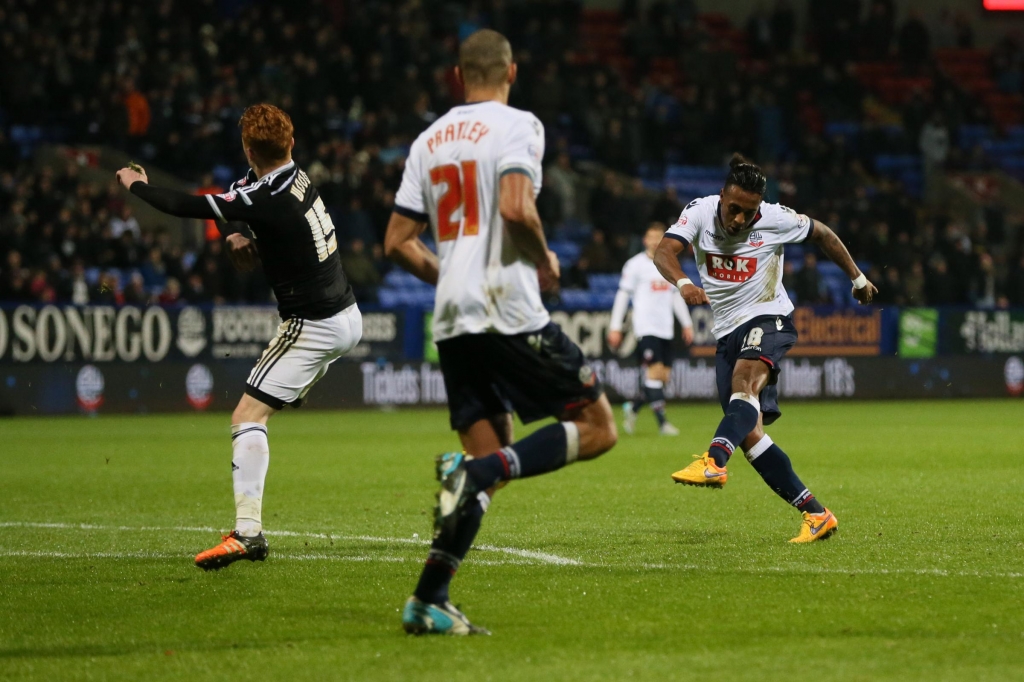 Neil Danns scores the equaliser for Wanderers against Brentford