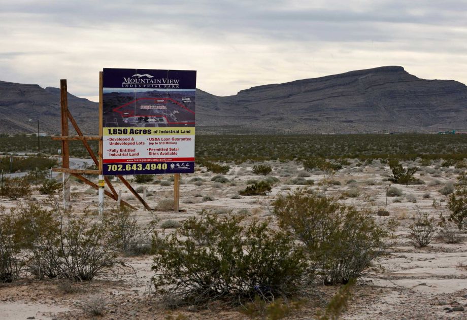 A sign advertises Mountain View Industrial Park near Apex Industrial Park on Wednesday Dec. 9 2015 in North Las Vegas Nev. Chinese-backed electric carmaker Faraday Future plans to build a manufacturing plant near the site according to a letter the