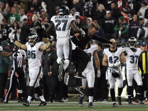 The Philadelphia Eagles celebrate their 35-28 win over the New England Patriots in an NFL football game Sunday Dec. 6 2015 in Foxborough Mass