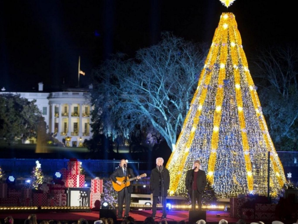 Members of Crosby Stills and Nash perform on stage during the National Christmas Tree Lighting ceremony at the Ellipse in Washington