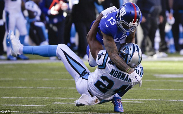 New York Giants wide receiver Odell Beckham and Carolina Panthers Josh Norman during the first half of Sunday's game