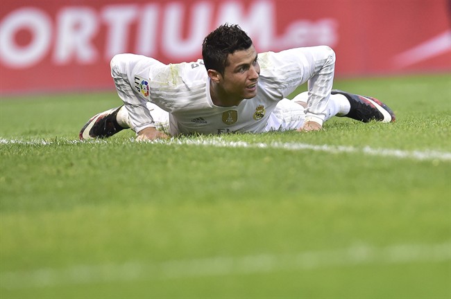 Real Madrid's Cristiano Ronaldo of Portugal laments after missing a goal during their Spanish La Liga soccer match between SD Eibar and Real Madrid at Ipurua stadium in Eibar northern Spain Sunday Nov. 29 2015. Real Madrid won the match 2-0. (AP Ph