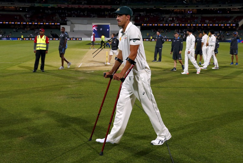 Mitchell Starc uses precautionary crutches during the presentation after the third test between Australia and New Zealand at the Adelaide Oval