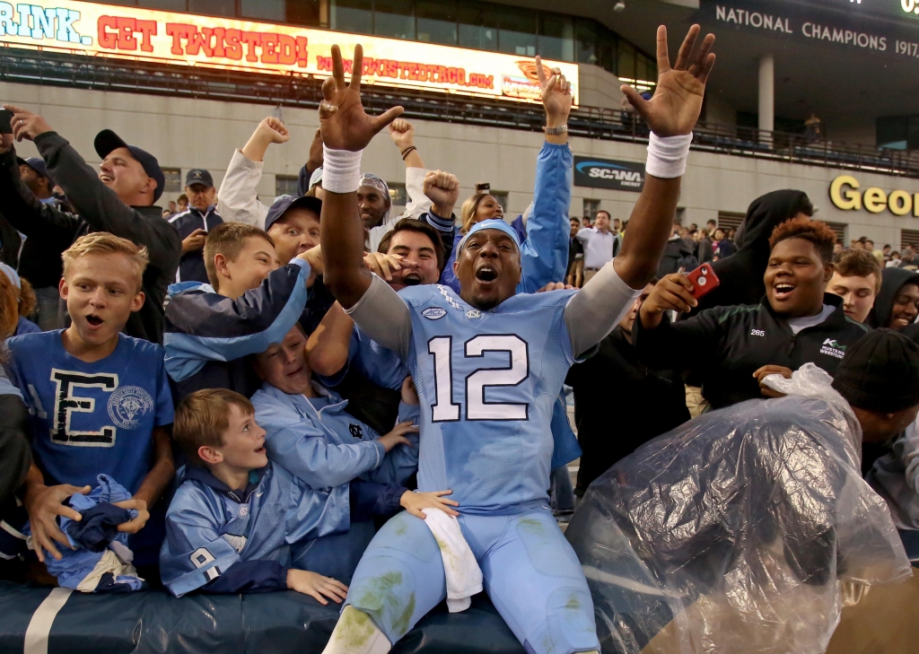 Oct 3 2015 Atlanta GA USA North Carolina Tar Heels quarterback Marquise Williams celebrates with fans after their win over the Georgia Tech Yellow Jackets at Bobby Dodd Stadium. North Carolina won 38-31. Mandatory Credit Jason Getz-USA TODAY Sp